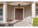 Front porch with double doors and stone accents at 3819 Se 38Th Loop, Ocala, FL 34480