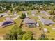 Aerial view of house with pool and surrounding area at 4864 Sw 103Rd Street Rd, Ocala, FL 34476