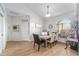 Dining room with wood floors, and rustic table at 4864 Sw 103Rd Street Rd, Ocala, FL 34476