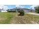 One story home with attached garage and basketball hoop at 4864 Sw 103Rd Street Rd, Ocala, FL 34476