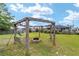 Backyard pergola with firepit and hammock at 4864 Sw 103Rd Street Rd, Ocala, FL 34476