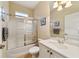 Clean bathroom with tub/shower combo, vanity, and updated fixtures at 4911 Sw 63Rd Loop, Ocala, FL 34474