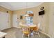 Charming breakfast nook with wood table and chairs at 4911 Sw 63Rd Loop, Ocala, FL 34474