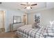 Spacious bedroom with a sizable bed, dresser, and walk-in closet at 4947 Sw 166Th Loop, Ocala, FL 34473