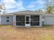 Exterior view of the house, showcasing the screened patio at 4947 Sw 166Th Loop, Ocala, FL 34473