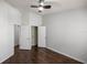 Bedroom with double door closet and wood floors at 4947 Sw 45Th Cir, Ocala, FL 34474