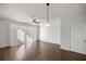 Living room featuring hardwood floors and a ceiling fan at 4947 Sw 45Th Cir, Ocala, FL 34474