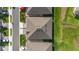 Top-down view of a house with gray roof and green lawn at 5395 Nw 46Th Ln, Ocala, FL 34482