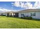 Aerial view showcasing multiple homes and lush green lawns at 5395 Nw 46Th Ln, Ocala, FL 34482