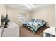 Bedroom with double bed, ceiling fan, and window coverings at 55 Almond Rd, Ocala, FL 34472