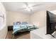 Bedroom with a double bed, ceiling fan, and flat screen TV at 55 Almond Rd, Ocala, FL 34472