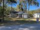 Newly built home with gray siding and a two car garage at 6450 Nw 57Th Ave, Ocala, FL 34482