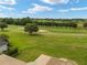 Golf course view with green fairways and sand traps at 7549 Nw 33Rd Pl, Ocala, FL 34482