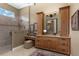 Large bathroom with double vanity and walk-in shower at 7549 Nw 33Rd Pl, Ocala, FL 34482