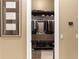 Walk-in closet with ample shelving and hanging space for clothes and shoes at 7549 Nw 33Rd Pl, Ocala, FL 34482