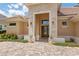 Elegant entryway with stone columns and a double door at 7549 Nw 33Rd Pl, Ocala, FL 34482