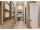 Long hallway with access to bedrooms and closets at 7549 Nw 33Rd Pl, Ocala, FL 34482