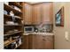 Well-organized pantry with ample shelving for storage at 7549 Nw 33Rd Pl, Ocala, FL 34482