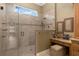 Large walk-in shower with multiple shower heads and tile surround at 7549 Nw 33Rd Pl, Ocala, FL 34482