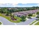 Aerial view of a community of villas with lush landscaping at 7617 Sw 96Th Avenue Rd, Ocala, FL 34481