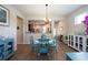 Bright dining area with a view of the kitchen, offering an open floor plan at 7617 Sw 96Th Avenue Rd, Ocala, FL 34481