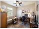 Bright home office features built-in desk and hardwood floors at 7617 Sw 96Th Avenue Rd, Ocala, FL 34481