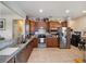 Spacious kitchen featuring stainless steel appliances and light wood cabinets at 7617 Sw 96Th Avenue Rd, Ocala, FL 34481