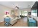 Comfortable living room featuring a neutral color palette and hardwood floors at 7617 Sw 96Th Avenue Rd, Ocala, FL 34481