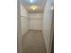 Large walk-in closet with wire shelving at 8009 County Road 109D, Lady Lake, FL 32159