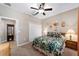 Bedroom with ceiling fan and double door closet at 8230 Sw 78Th Cir, Ocala, FL 34476