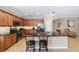 Eat-in kitchen with granite countertops and stainless steel appliances at 8230 Sw 78Th Cir, Ocala, FL 34476