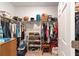 Large walk-in closet with ample hanging space and shelving at 8230 Sw 78Th Cir, Ocala, FL 34476