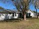 View of home's back and screened porch at 8340 Sw 108Th Place Rd, Ocala, FL 34481