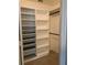 Spacious walk-in closet with shelving and hanging rods at 8340 Sw 108Th Place Rd, Ocala, FL 34481