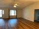 Bright living room featuring hardwood floors and large windows at 8340 Sw 108Th Place Rd, Ocala, FL 34481