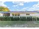 Landscaped backyard with house exterior view at 8961 Sw 94Th Ln # C, Ocala, FL 34481