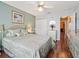 Bedroom with a queen-size bed and built-in closet at 9203 Se 179Th Lunsford Ln, The Villages, FL 32162