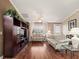 Living room with hardwood floors and two sofas at 9203 Se 179Th Lunsford Ln, The Villages, FL 32162