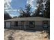 Charming single-story home featuring a neutral color scheme and an attached single car garage at 10538 Se 50Th Ave, Belleview, FL 34420