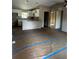 Bright kitchen with white cabinetry, and stone countertops, perfect for cooking and entertaining at 10538 Se 50Th Ave, Belleview, FL 34420