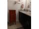 Double vanity bathroom with granite countertop at 10871 Sw 62Nd Avenue Rd, Ocala, FL 34476