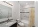 Bathroom featuring single sink with granite countertops, and tub/shower combo at 10871 Sw 62Nd Avenue Rd, Ocala, FL 34476