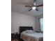 Bright bedroom with a comfortable bed and ceiling fan at 10871 Sw 62Nd Avenue Rd, Ocala, FL 34476
