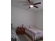 Bright bedroom with ceiling fan and double bed at 10871 Sw 62Nd Avenue Rd, Ocala, FL 34476