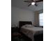 Bedroom with a queen bed and ceiling fan at 10871 Sw 62Nd Avenue Rd, Ocala, FL 34476
