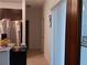 Bright hallway with light walls and tile floors at 10871 Sw 62Nd Avenue Rd, Ocala, FL 34476