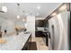 Spacious kitchen featuring an island with sink and stainless steel appliances at 10871 Sw 62Nd Avenue Rd, Ocala, FL 34476