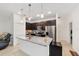 Stylish kitchen island with granite countertops and stainless steel appliances at 10871 Sw 62Nd Avenue Rd, Ocala, FL 34476