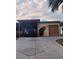 House exterior with carport and garage at 1628 Bay Meadows Ln, The Villages, FL 32159
