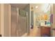 Clean bathroom with a shower/tub combo and updated vanity at 17096 Se 96Th Chapelwood Cir, The Villages, FL 32162
